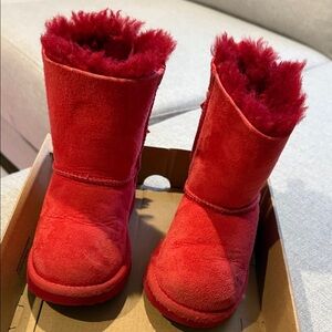 Red badly used Ugg Bailey Bow boots size toddler 9.